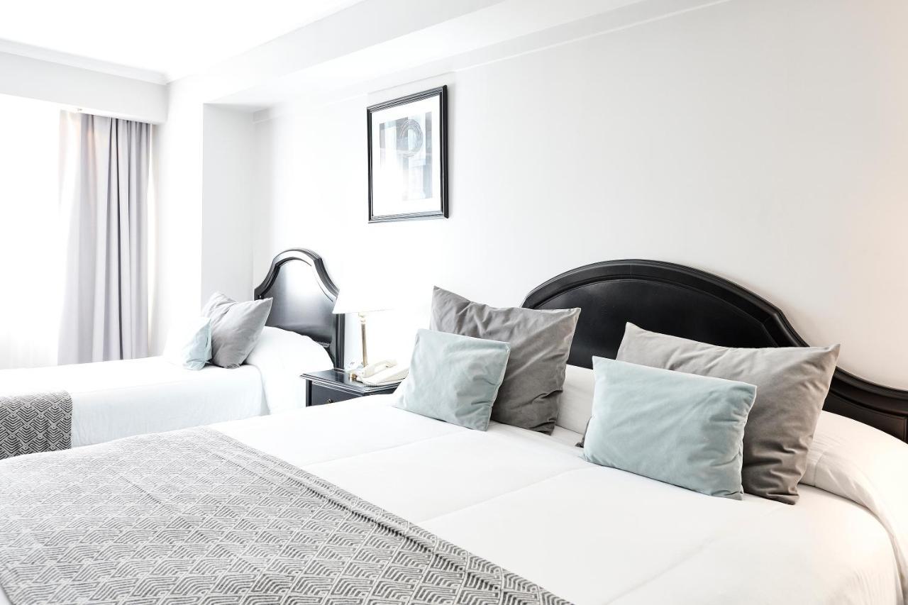 Plaza Real Suites Hotel Росарио Екстериор снимка