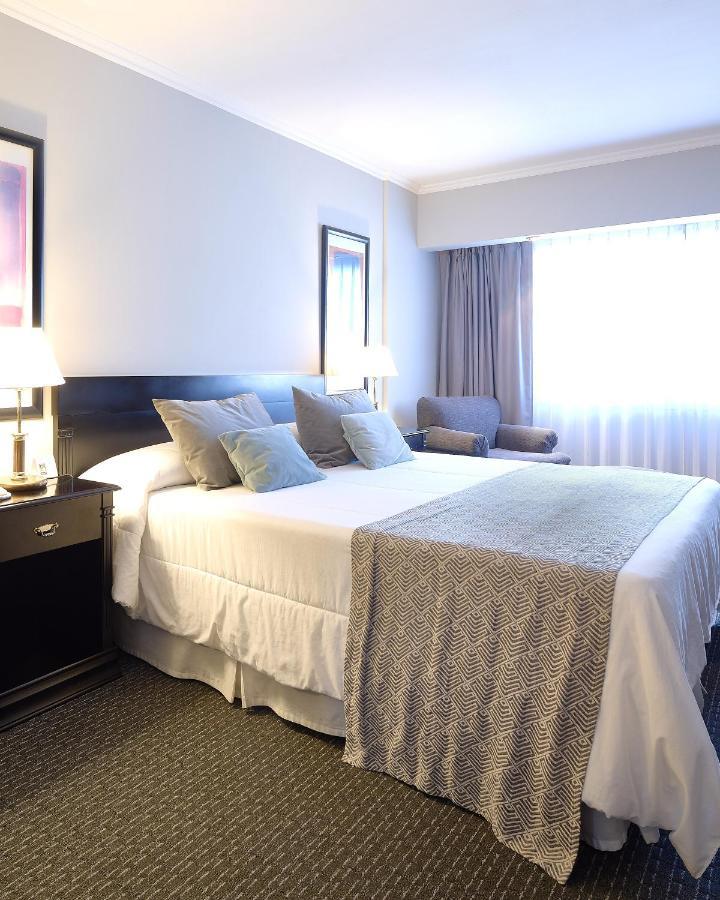 Plaza Real Suites Hotel Росарио Екстериор снимка